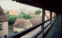 Its possible to climbe up to the top of the city walls and walk around along this covered wooden walkway.